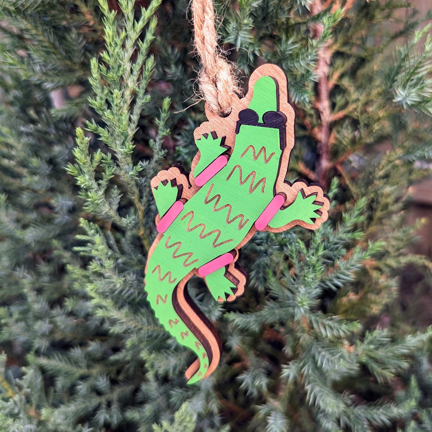 Chill Alligator Christmas Ornament, Alligator wearing pink pool floaties and black sunglasses